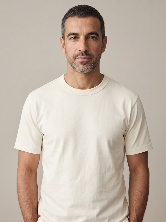 Karim in off-white Uniqlo Crew Neck Tee