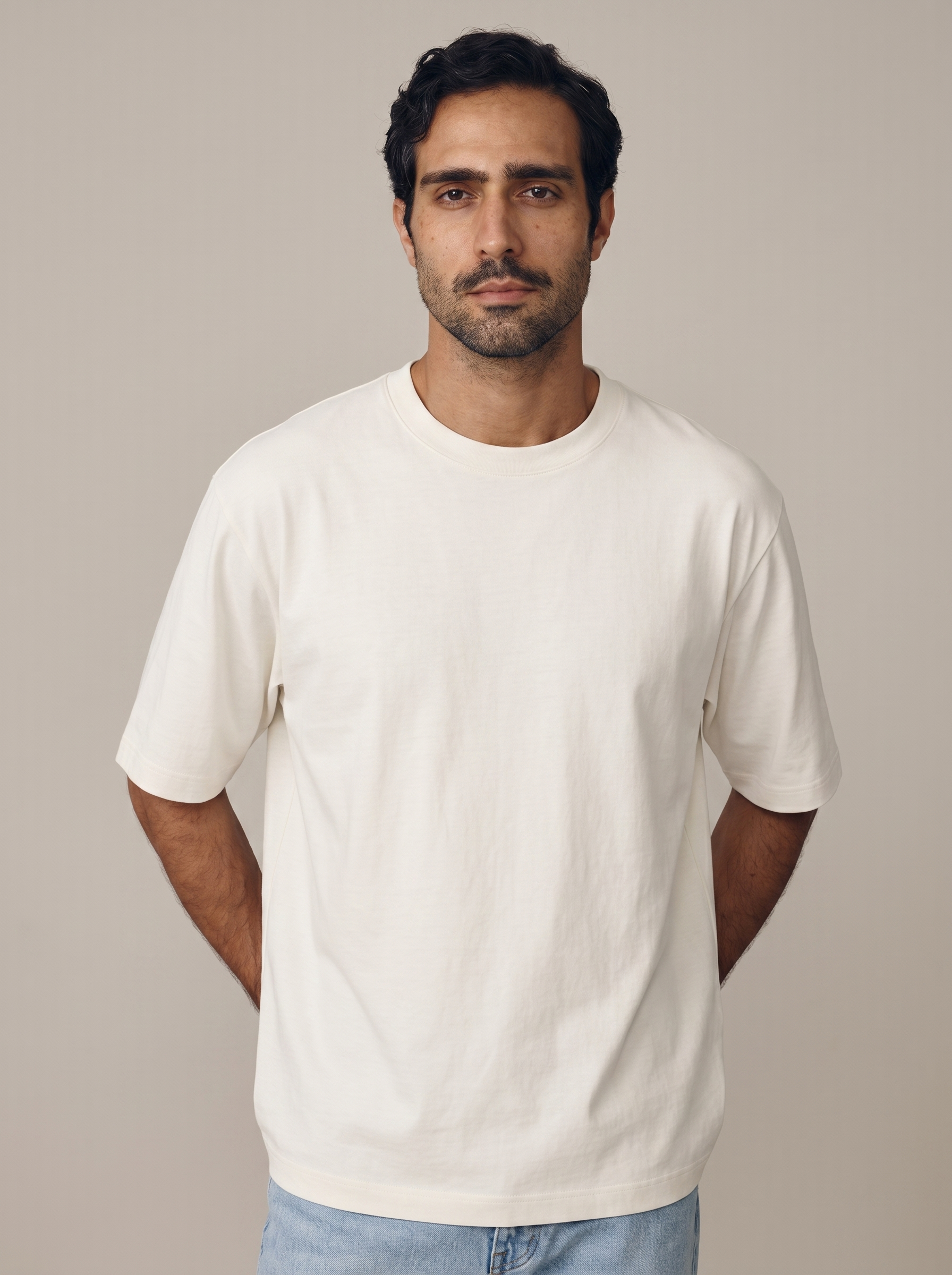 Tarek in off-white Uniqlo AIRism Oversized Tee